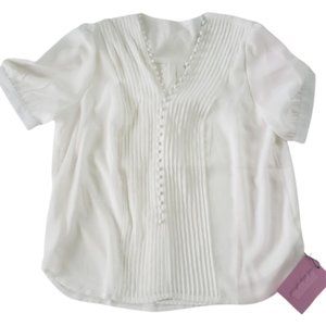 Elegant White Blouse new with tag.